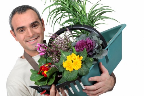 Garden maintenance in East Ham carried out with insurance and safety measures